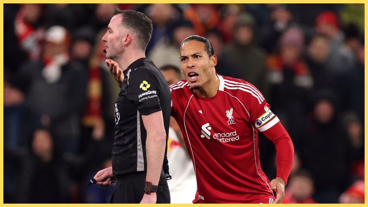 Virgil van Dijk of Liverpool reacts as he speaks to Referee Chris Kavangh