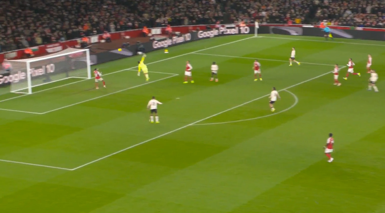 Conor Bradley sees his effort come back off the crossbar after chipping David Raya