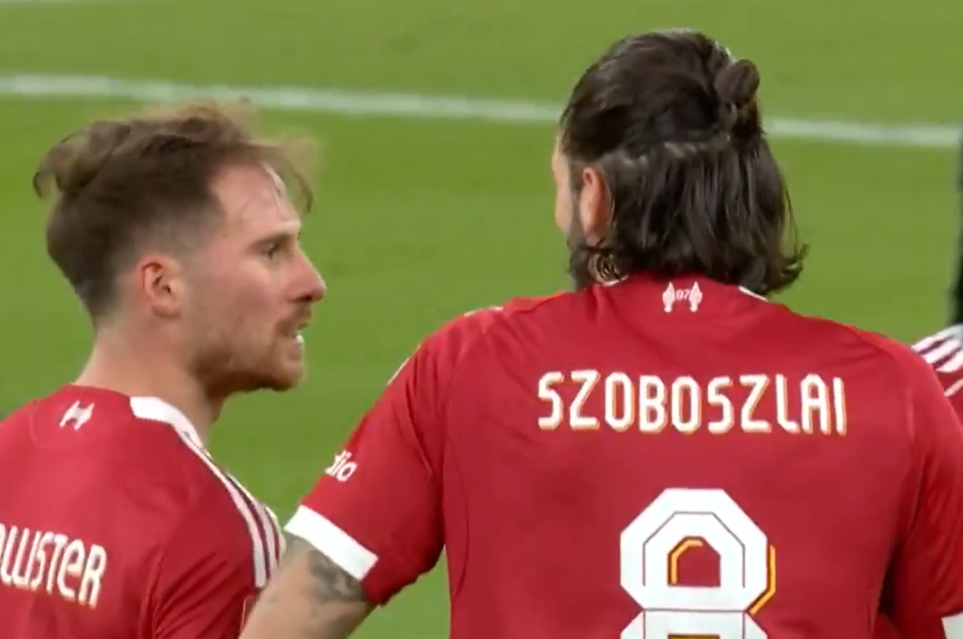 Alexis Mac Allister congratulates Dominik Szoboszlai after the Hungarian's goal against Barnsley