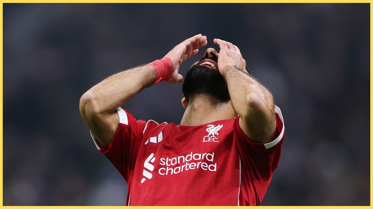 Mo Salah reacts to missing a chance for Liverpool in their 3-0 win over Marseille