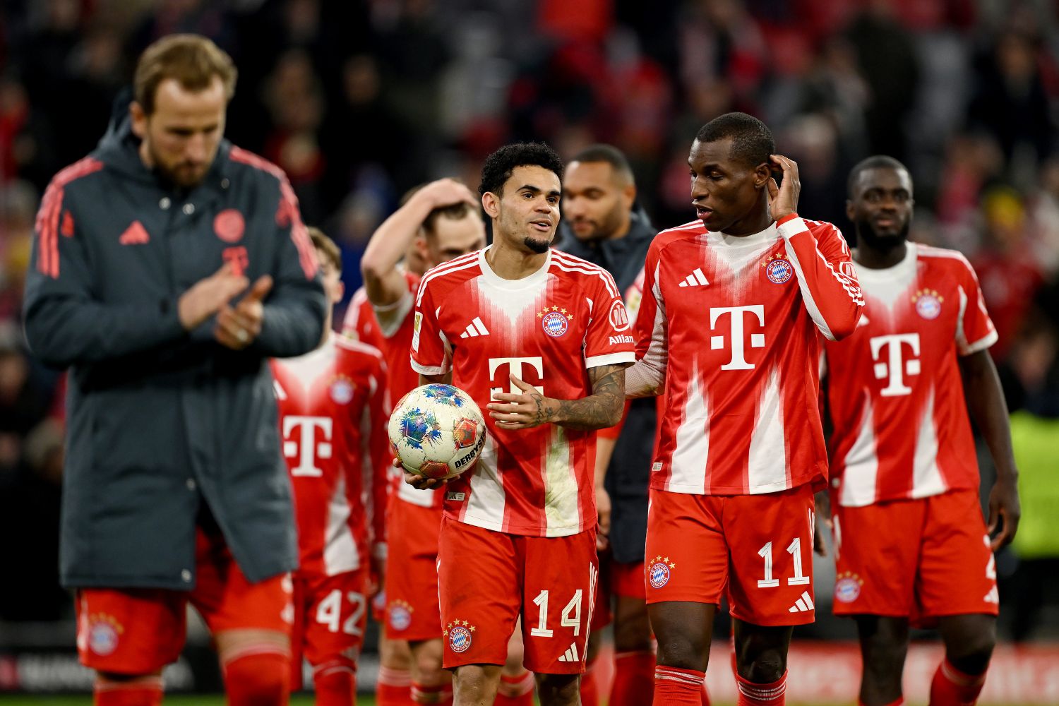 Luis Diaz and Nicolas Jackson of FC Bayern Munich interact after their victory in the Bundesliga match between FC Bayern München and TSG Hoffenheim
