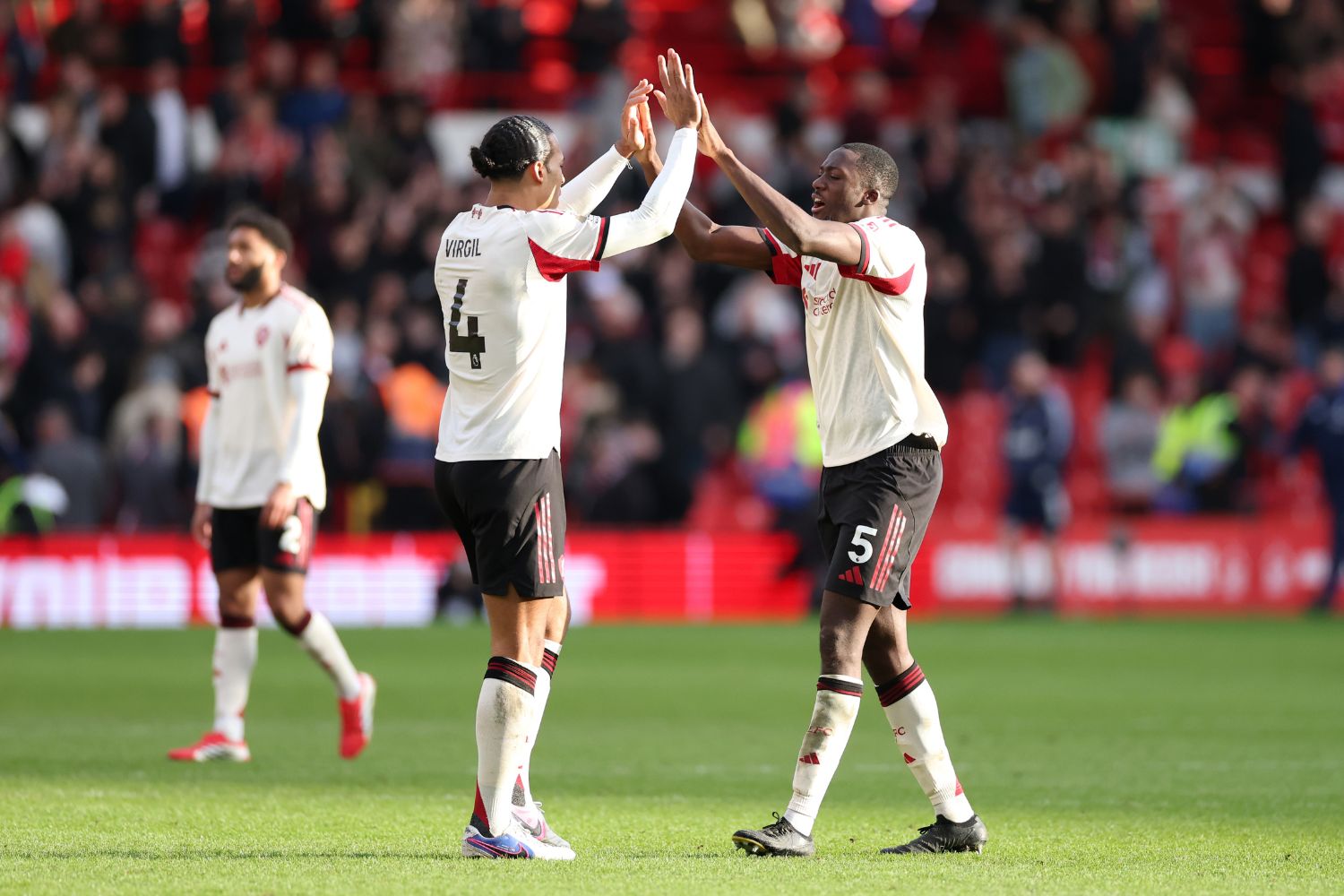 Ibou Konate and Virgil van Dijk celebrate against Nottingham Forest