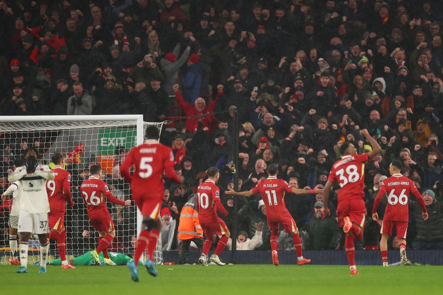 Mohamed Salah of Liverpool celebrates scoring his team's second goal from the penalty-spot during the Premier League match between Liverpool FC and Manchester United