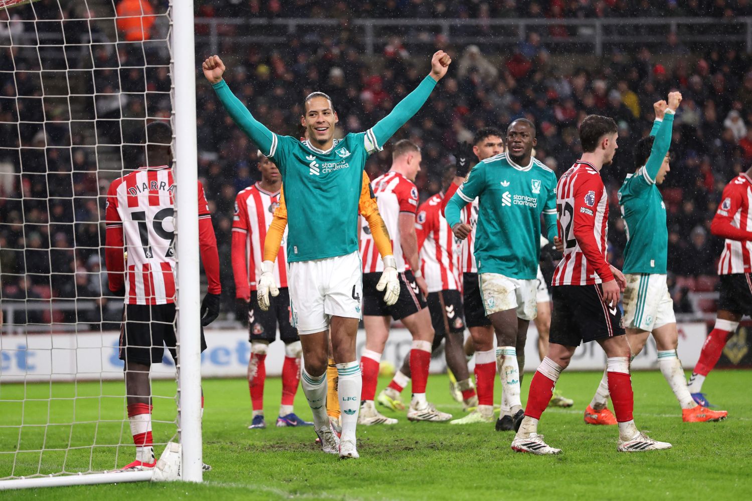Virgil van Dijk celebrates scoring against Sunderland