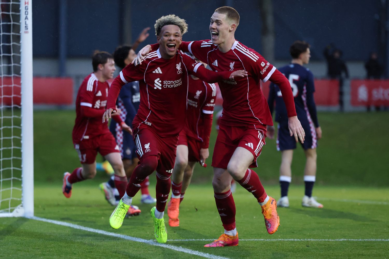 Trent Kone-Doherty of Liverpool celebrates scoring his team's first goal with teammate Carter Pinnington