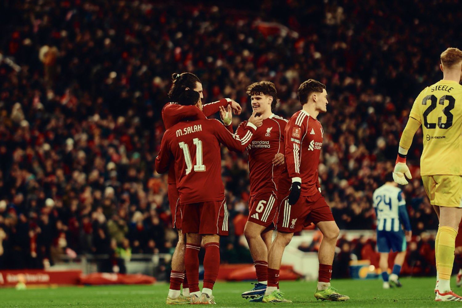 Milos Kerkez celebrates with Mo Salah and Dominik Szoboszlai