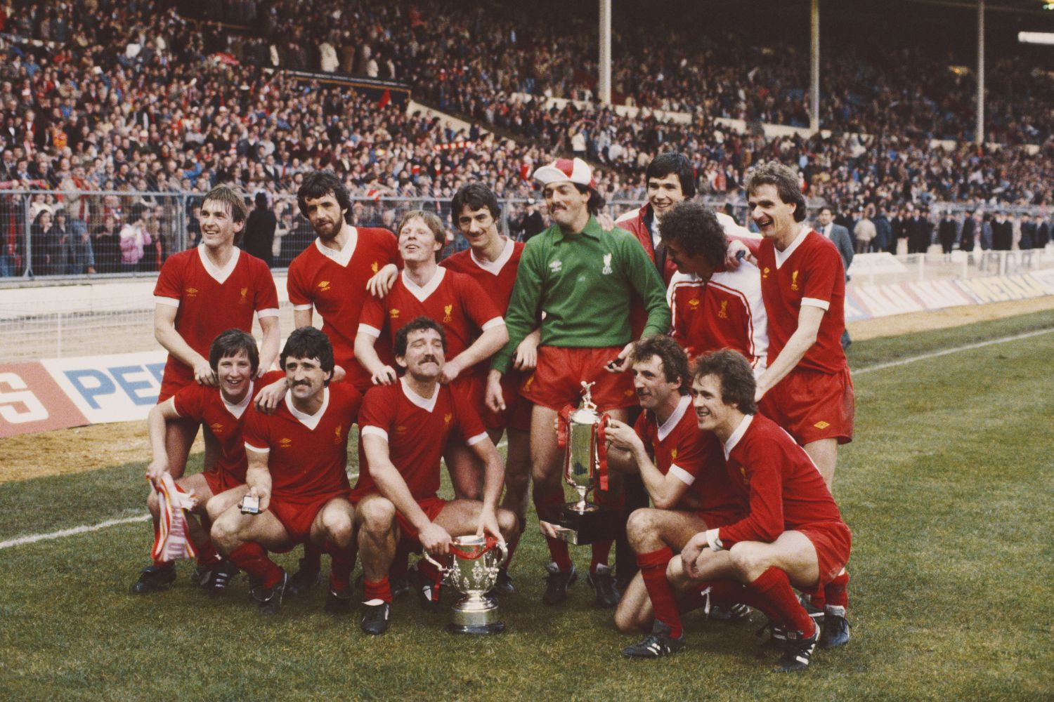 The victorious Liverpool team pose after their 3-1 victory over Tottenham Hotspur to win the 1982 Milk Cup Final at Wembley Stadium on March 13, 1982