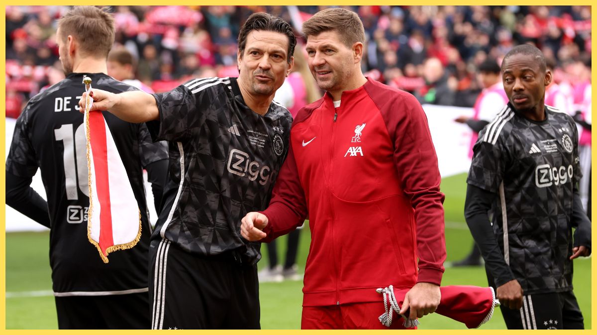 Jari Litmanen of Ajax Legends looks on with Steven Gerrard of Liverpool Legends