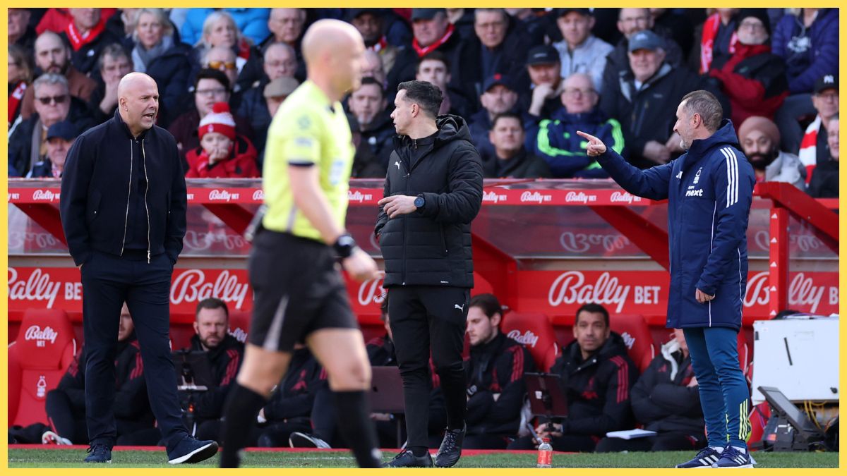 Arne Slot, Manager of Liverpool, interacts with Vítor Pereira, Manager of Nottingham Forest
