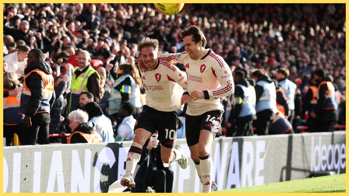 Alexis Mac Allister of Liverpool celebrates with his teammate Federico Chiesa