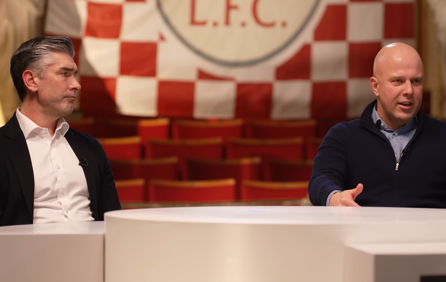 Richard Hughes and Arne Slot pictured during a roundtable discussion for Liverpool's official channels