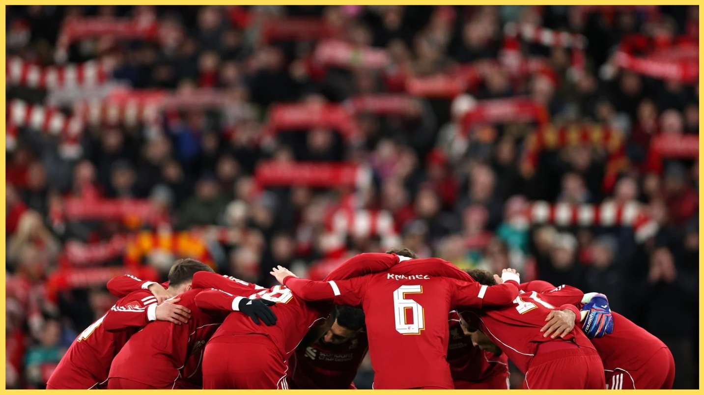 Liverpool players form a huddle before their FA Cup match against Brighton