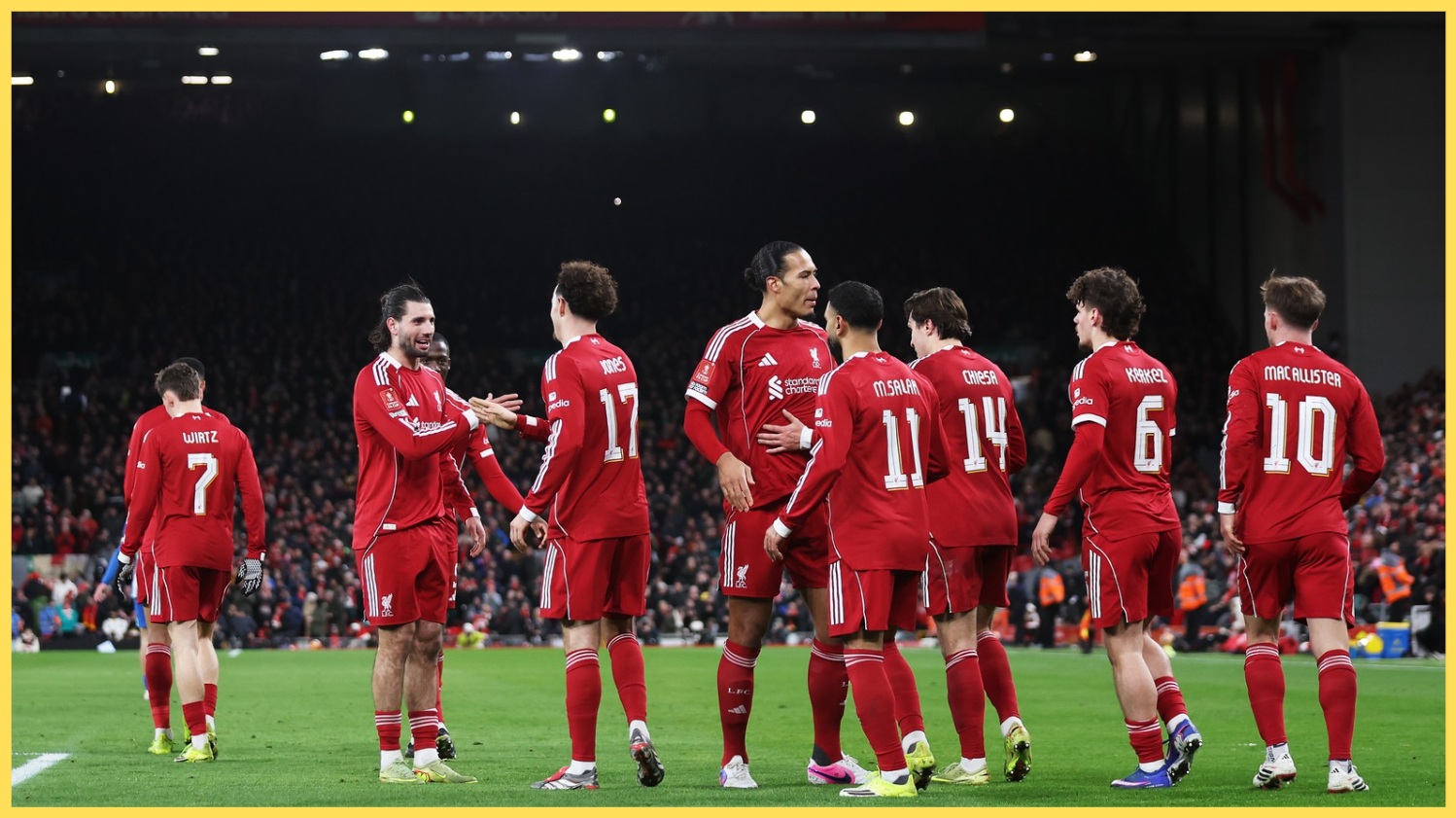 Liverpool players celebrate one of their goals against Brighton