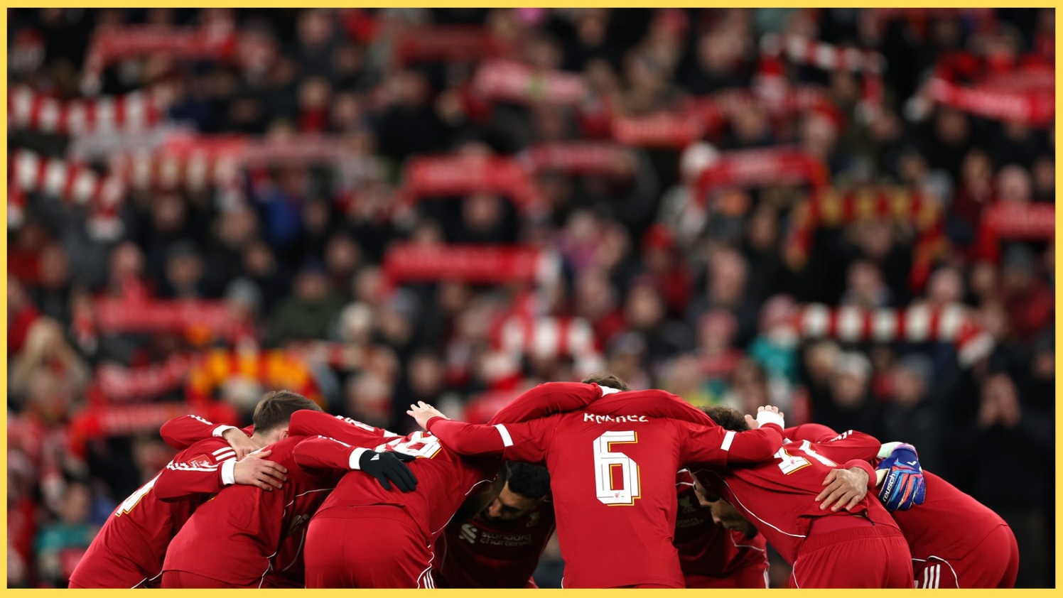 Liverpool players form a huddle before their FA Cup match against Brighton
