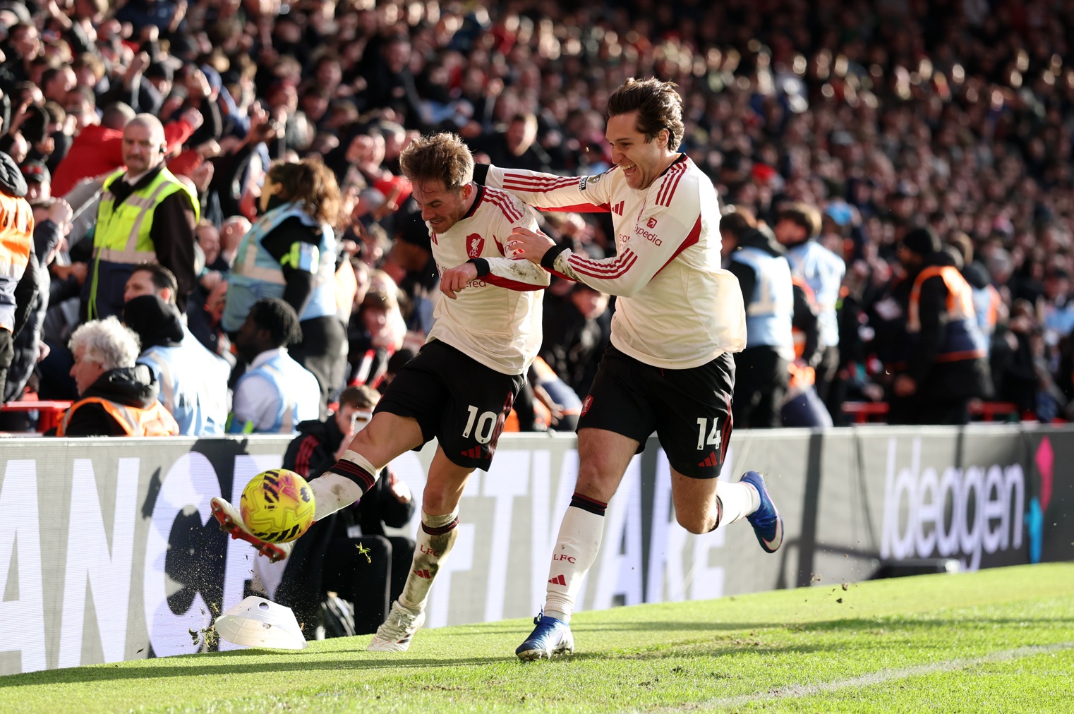 Alexis Mac Allister boots a ball in celebration alongside Federico Chiesa after scoring Liverpool's winner against Nottingham Forest