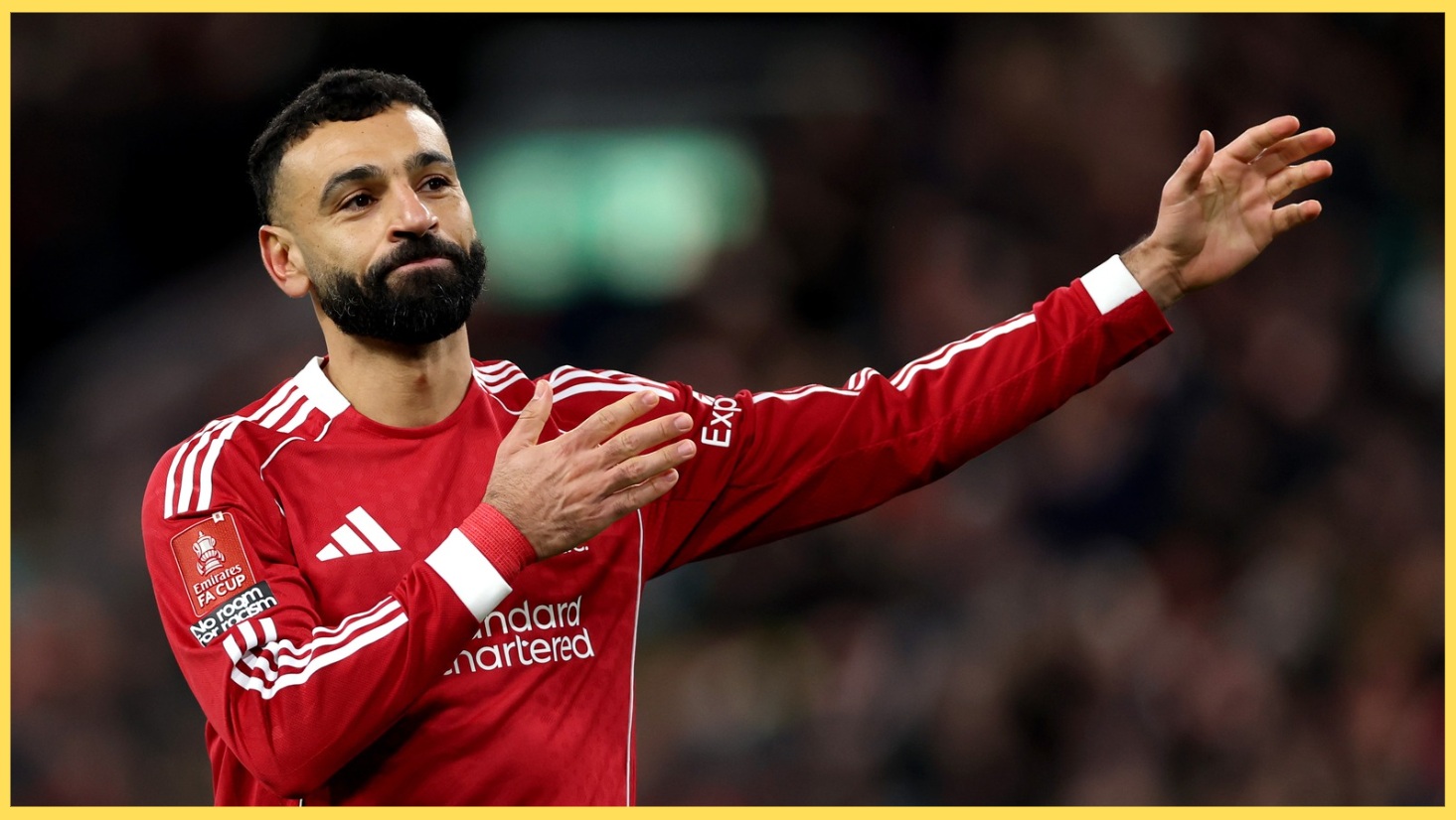 Mo Salah celebrates scoring against Brighton