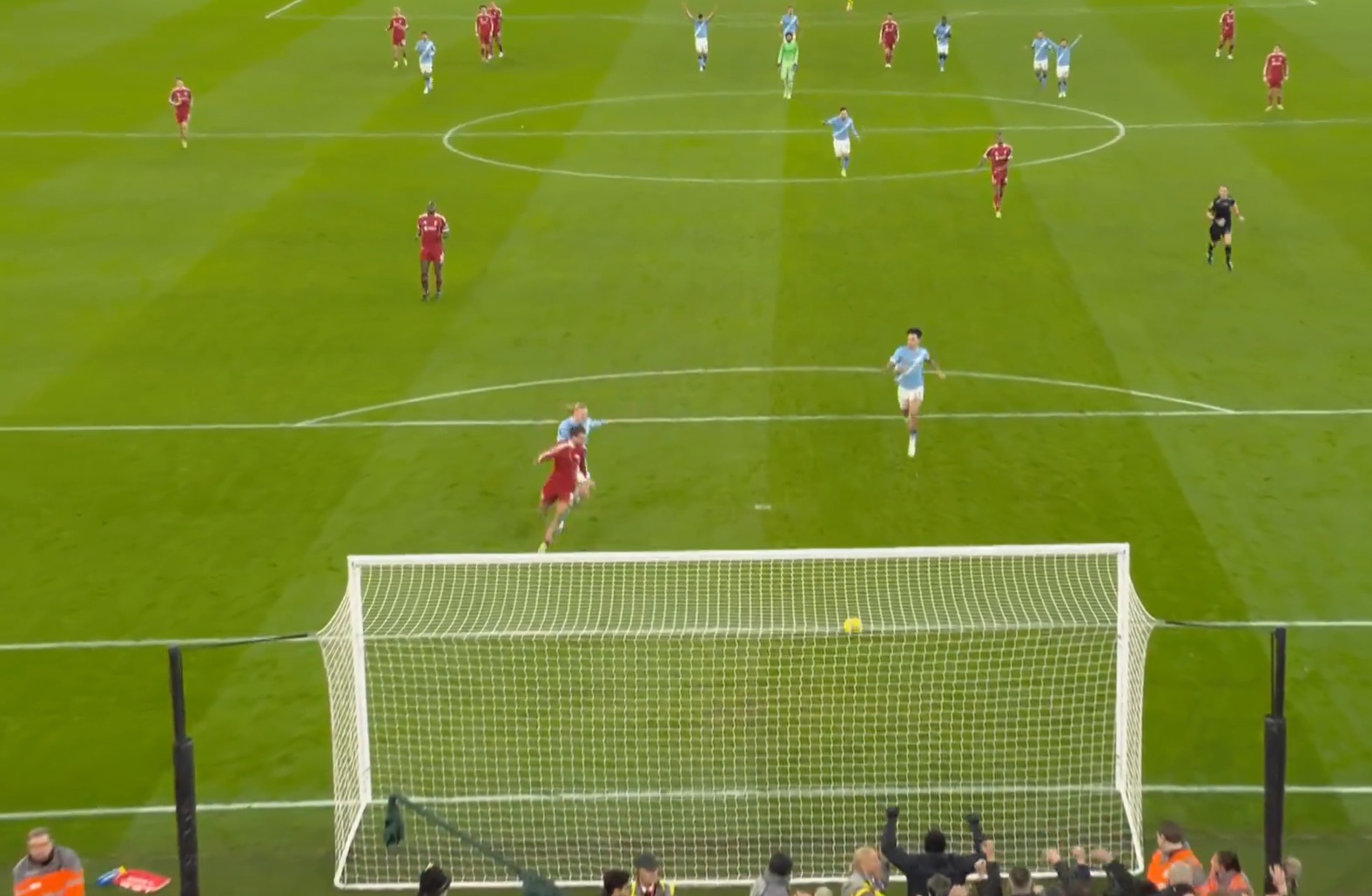 Nico O'Reilly inadvertently blocked Craig Pawson's view of Erling Haaland's shirt tug on Dominik Szoboszlai