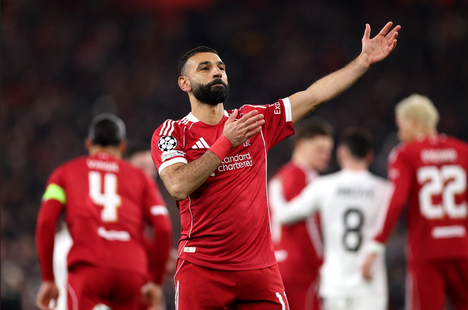 Mo Salah celebrates scoring for Liverpool in the Champions League