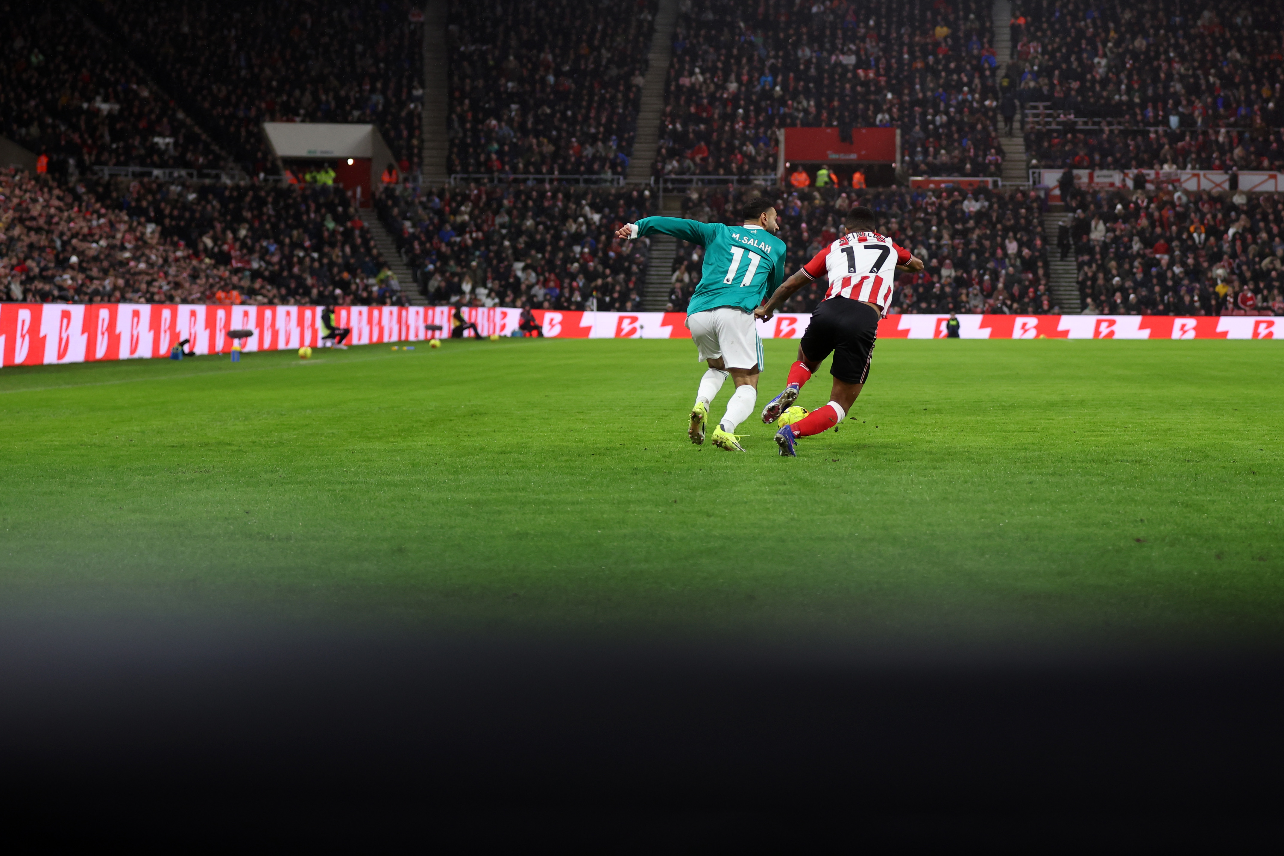 Mo Salah chases Reinildo Mandava in Liverpool's win over Sunderland