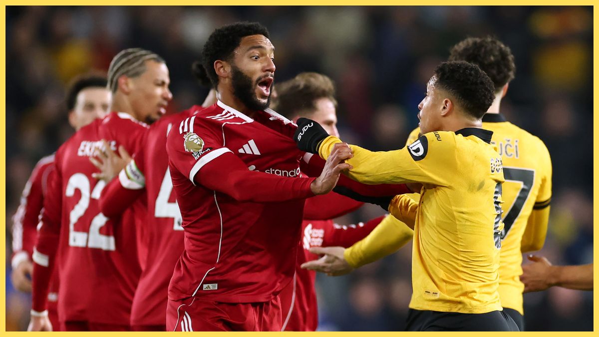 Joe Gomez of Liverpool clashes with Joao Gomes of Wolverhampton Wanderers