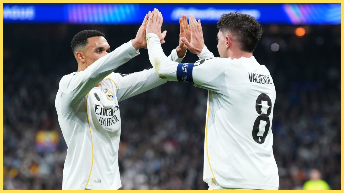 Federico Valverde of Real Madrid celebrates scoring his team's second goal with teammate Trent Alexander-Arnold during the UEFA Champions League 2025/26 Round of 16 First Leg match between Real Madrid CF and Manchester City