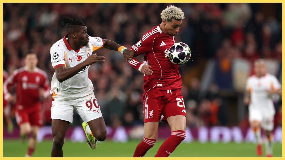 Hugo Ekitike of Liverpool controls the ball whilst under pressure from Wilfried Singo of Galatasaray