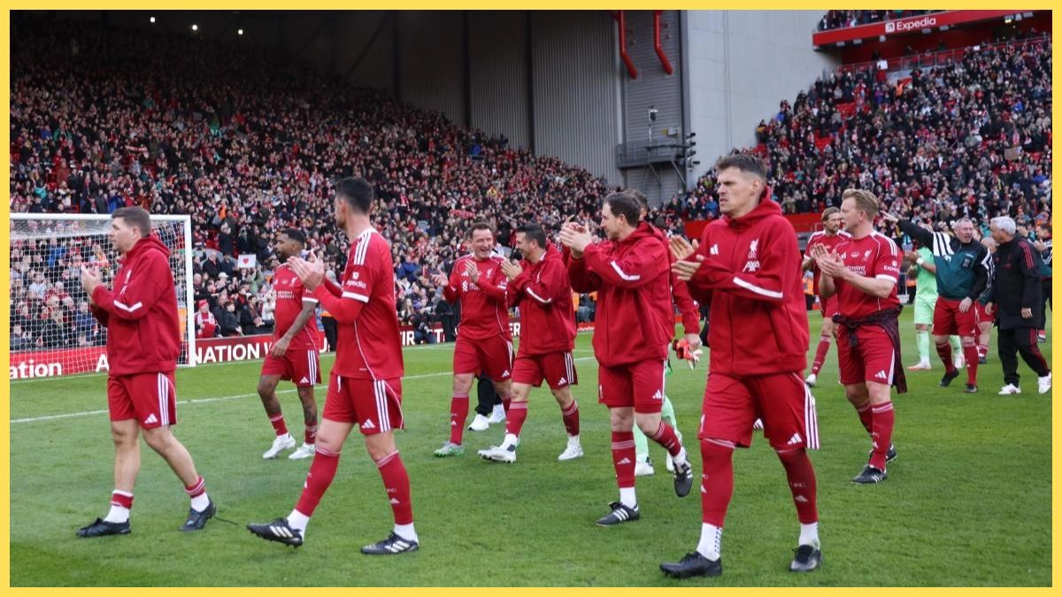 Liverpool Legends applaud Liverpool fans after full-time vs Borussia Dortmund at Anfield