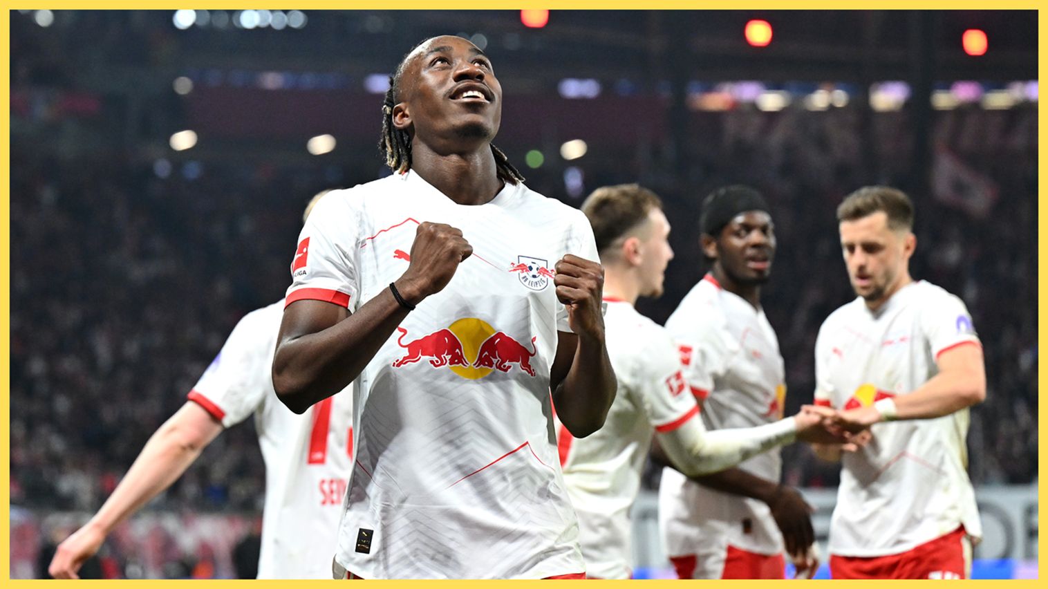 Yan Diomande celebrates with balled fists during RB Leipzig game.