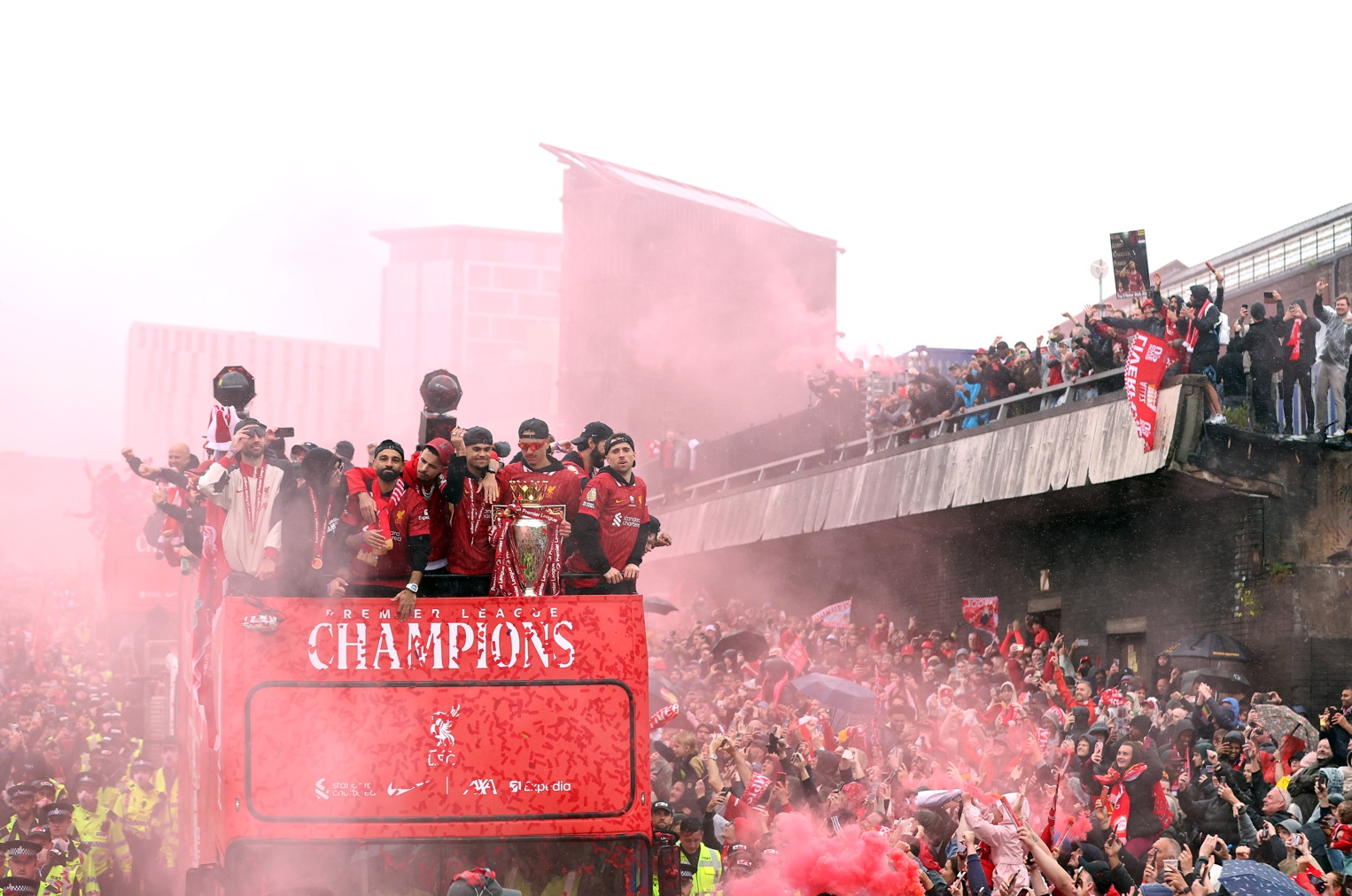 Liverpool players parade the Premier League trophy through the city in May 2025
