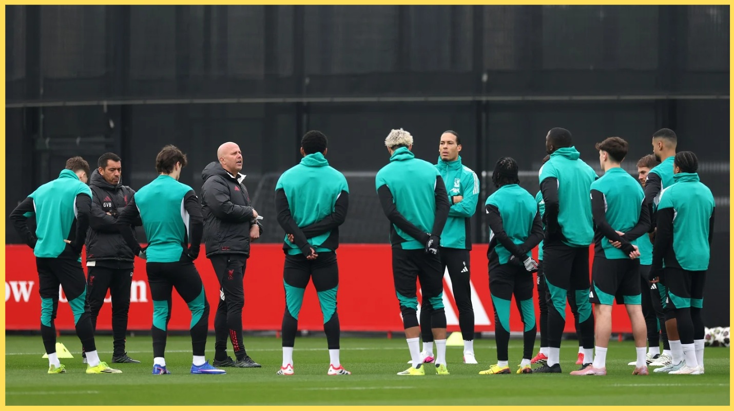 Arne Slot addresses his Liverpool players during a training session