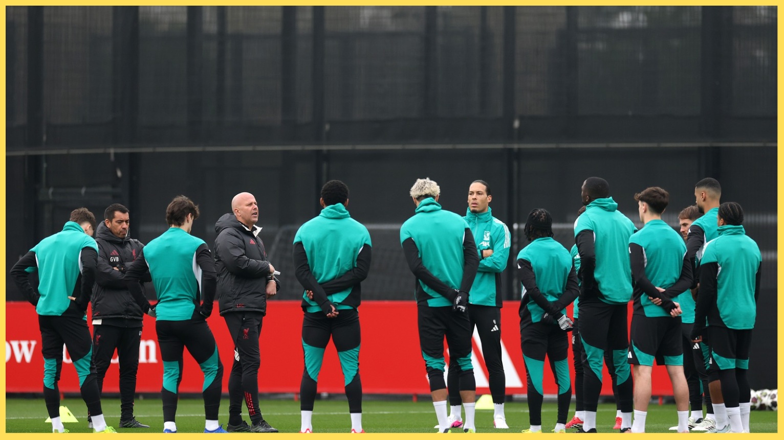 Arne Slot speaks to his Liverpool squad during training