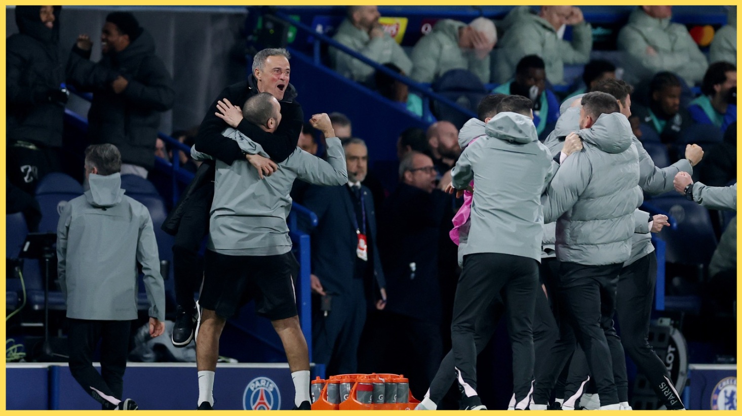 Luis Enrique celebrates with his PSG coaching staff