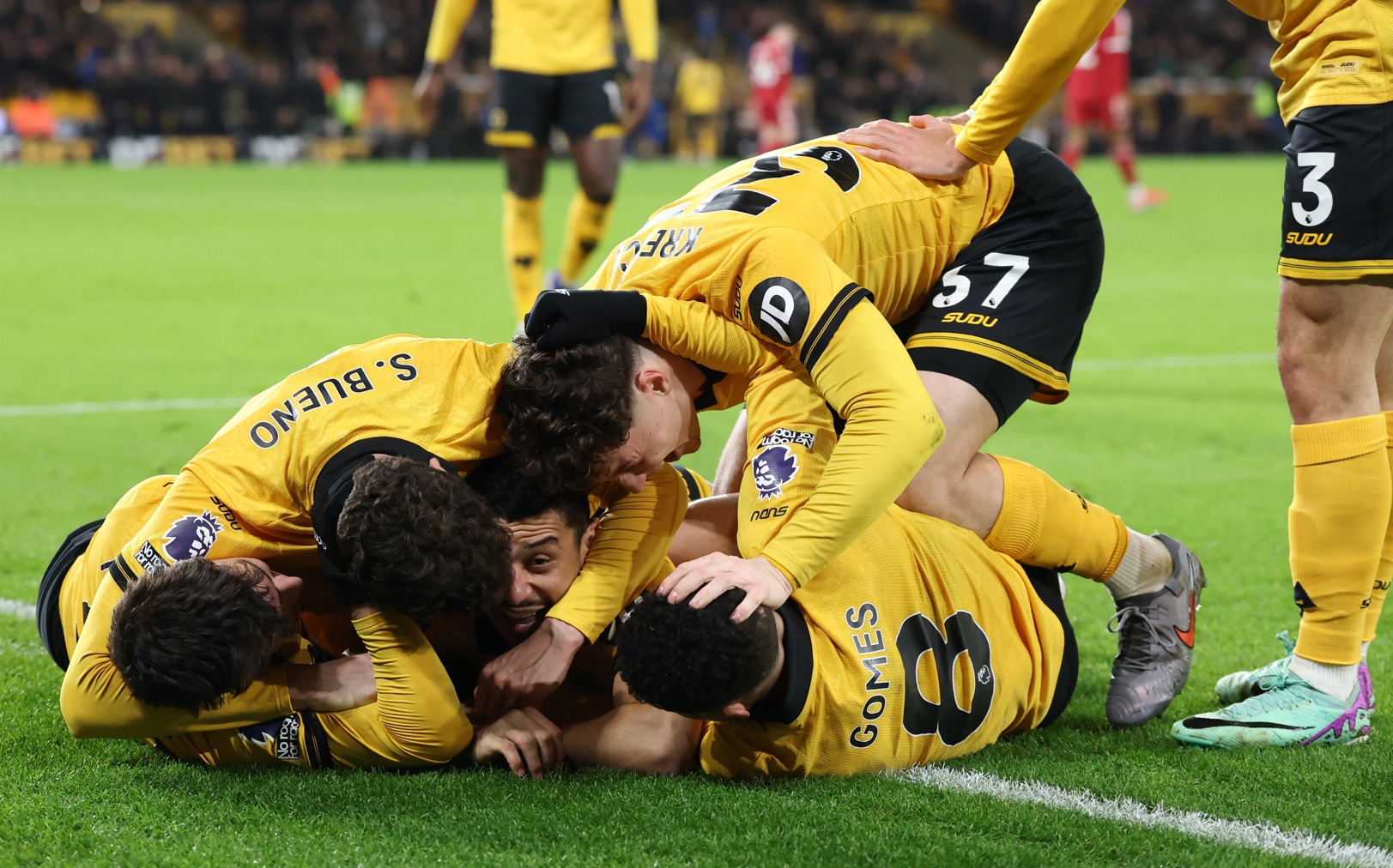 Wolves players celebrate their last-gasp winner against Liverpool at Molineux