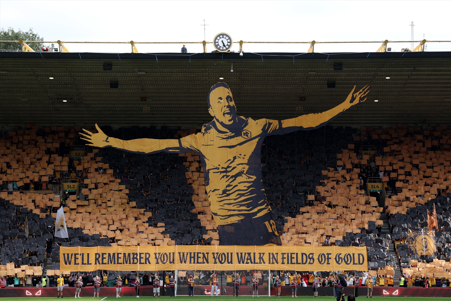 Wolves fans display a tifo in tribute to the late Diogo Jota at Molineux