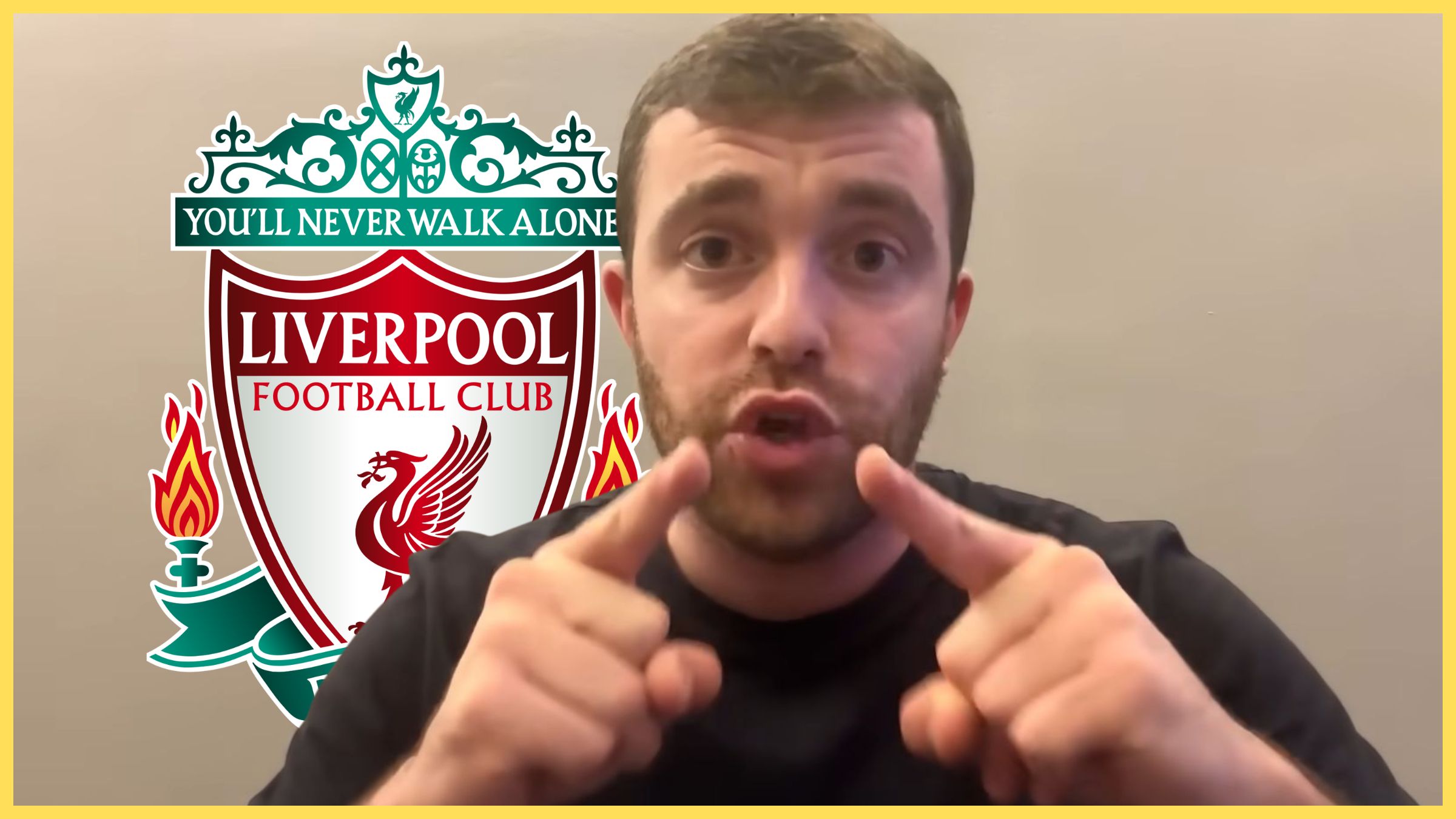 Fabrizio Romano points both fingers at the screen in front of Liverpool club crest.