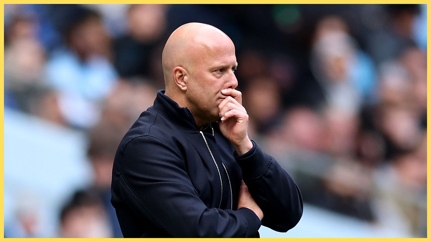 Arne Slot looks worried during Liverpool game.