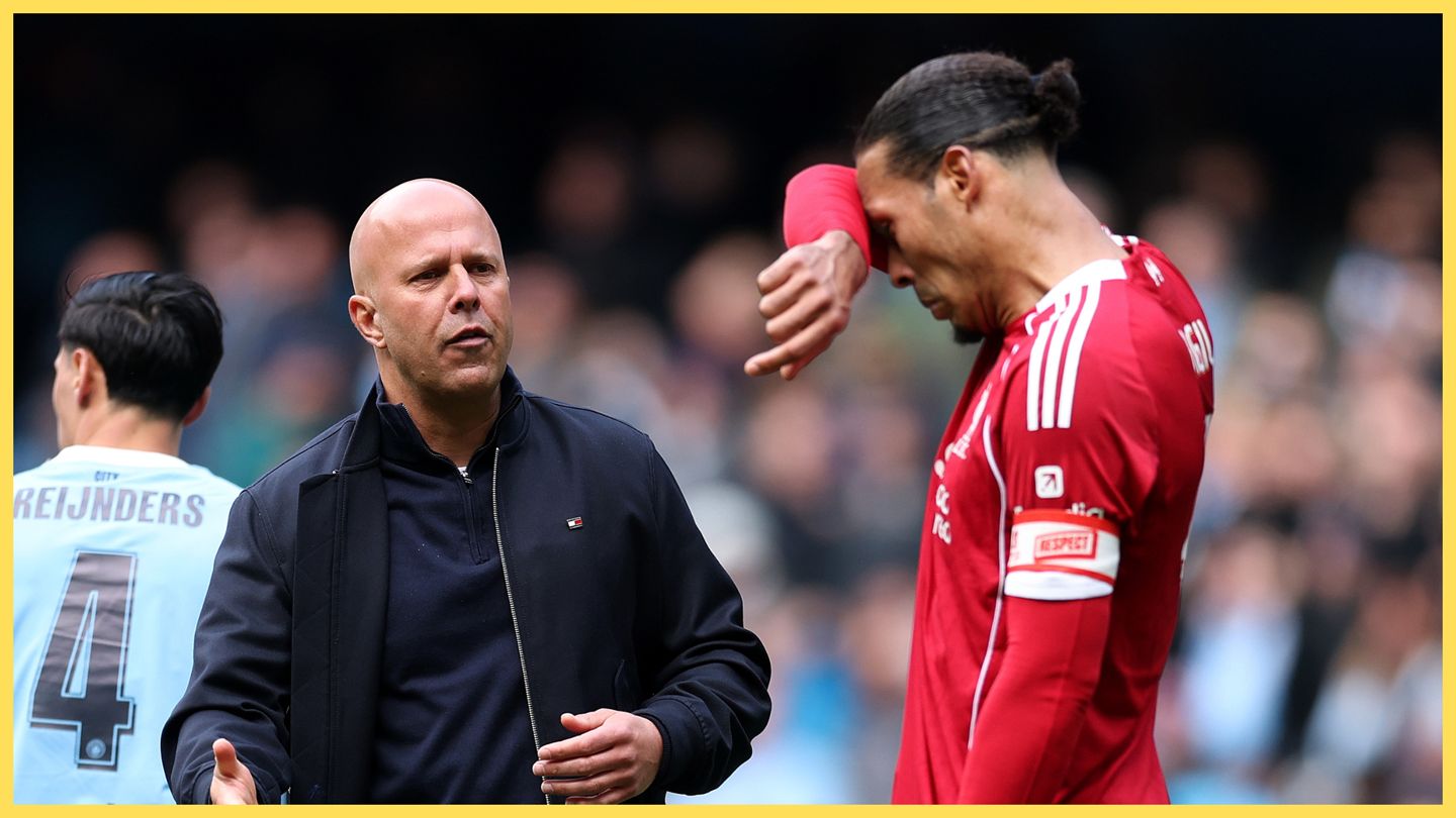 Virgil van Dijk wipes his forehead with the back of his forearm during Liverpool game.