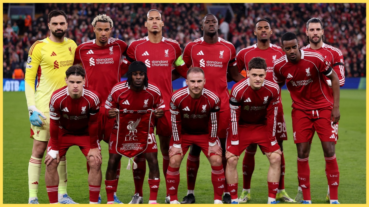 Liverpool players pose for a team photo before their match against PSG at Anfield