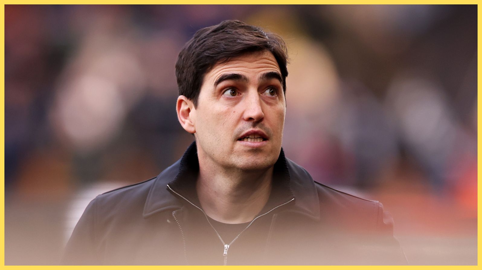 Liverpool manager Andoni Iraola looks on in wide-eyed shock during Premier League game.