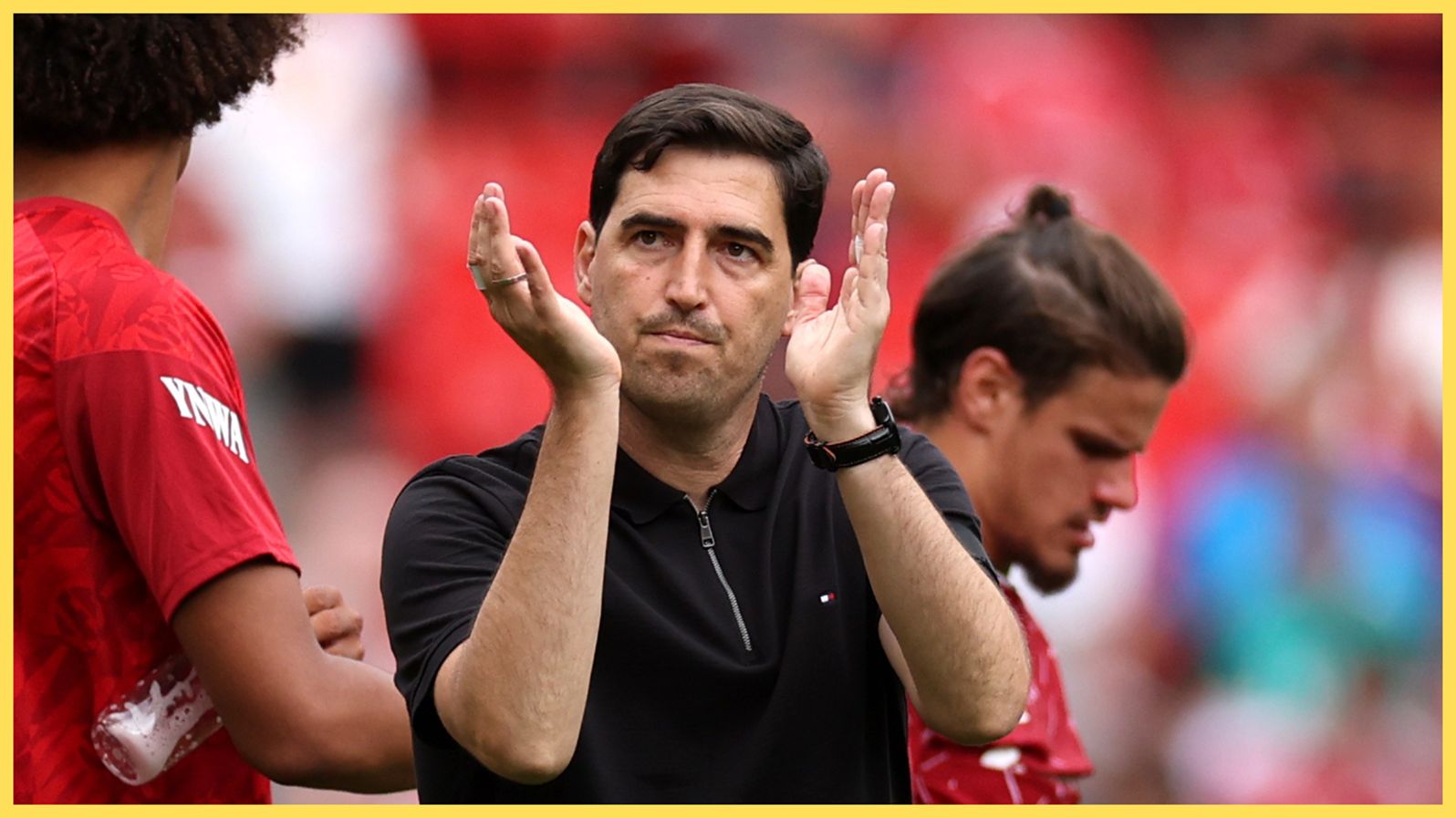 Liverpool manager Andoni Iraola claps his hands after Monaco game.