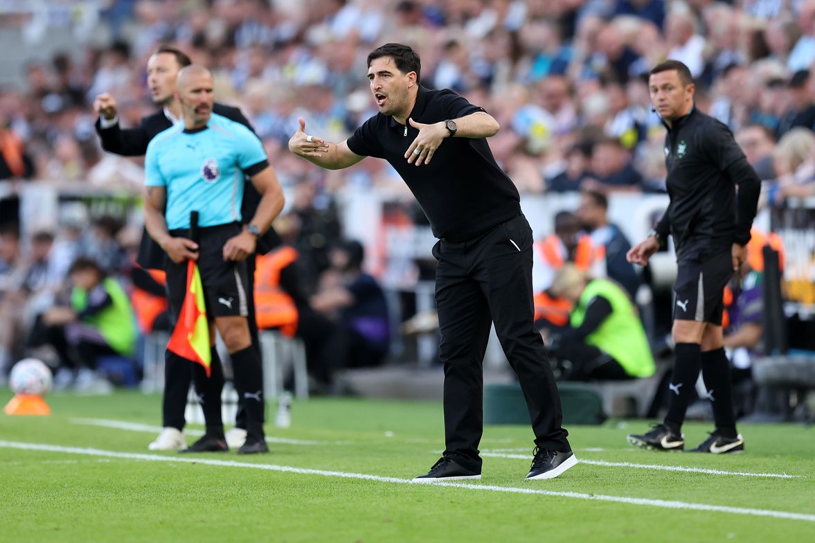 Liverpool manager Andoni Iraola gestures from the touchline.