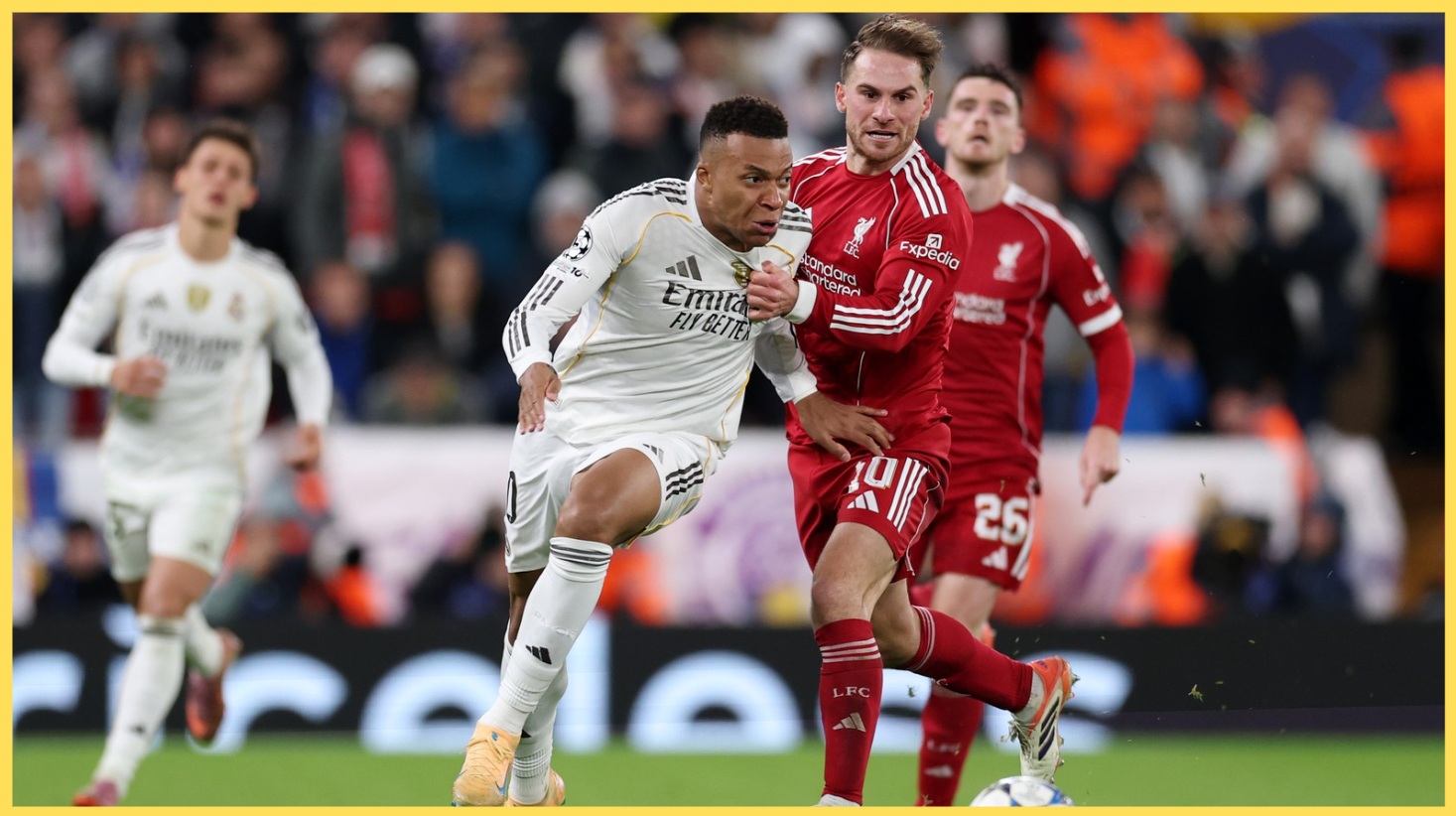 Kylian Mbappe and Alexis Mac Allister view for possession