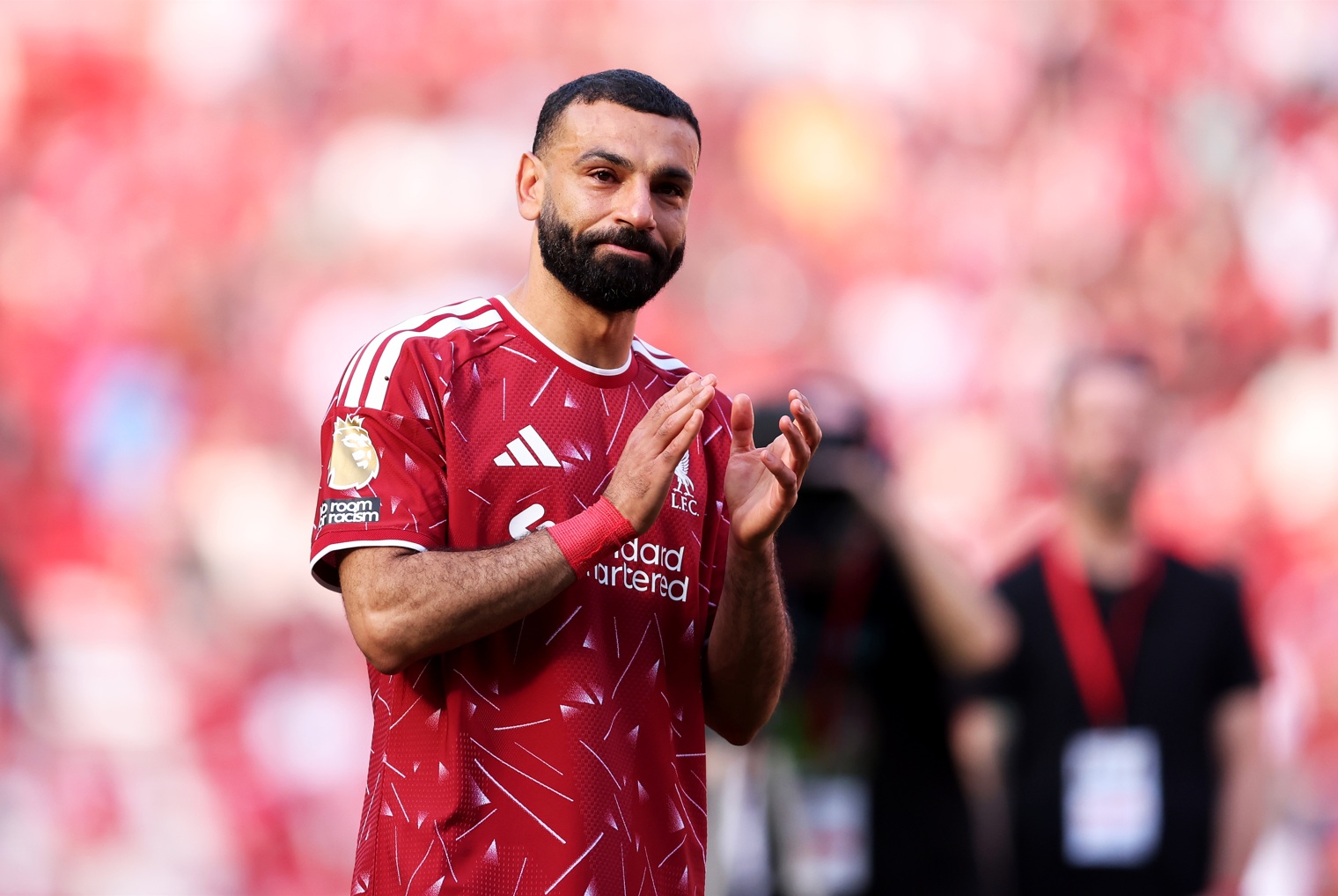 Mo Salah applauds the Liverpool fans after his final match at Anfield