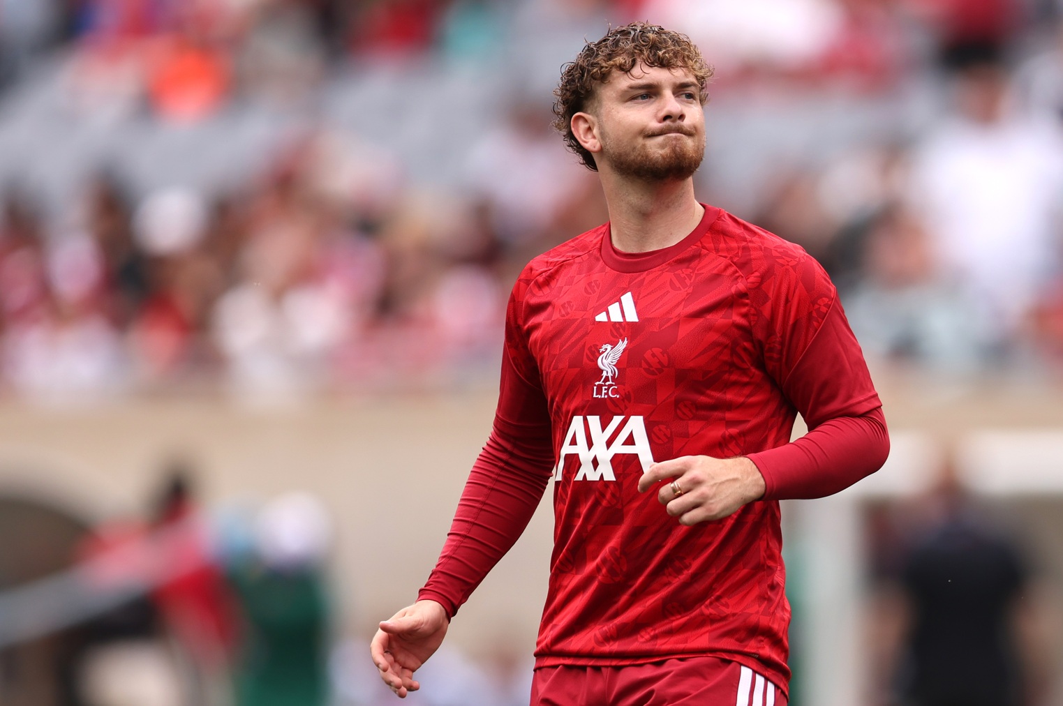 Harvey Elliott pictured during the warm-up prior to a Liverpool match